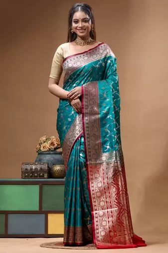 Teal green & red katan silk saree with zari woven border & traditional floral design