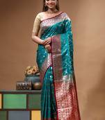 Teal green & red katan silk saree with zari woven border & traditional floral design