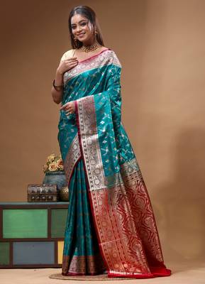 Teal green & red katan silk saree with zari woven border & traditional floral design 2