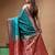 Teal green & red katan silk saree with zari woven border & traditional floral design