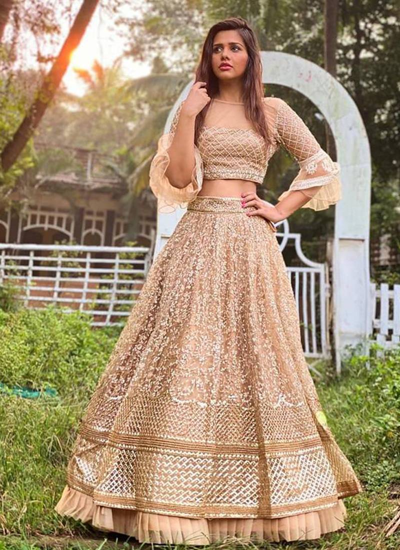 Beige Embroidered Net Semi Stitched Lehenga