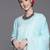 Women Turquoise Blue Floral Embroidered Mirror Work Chanderi Silk Kurta with Trousers & With
