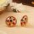 Gold multicolor studs