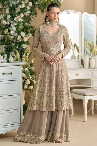 Faux georgette readymade palazzo suit with embroidered work in beige