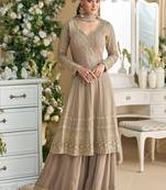 Faux georgette readymade palazzo suit with embroidered work in beige