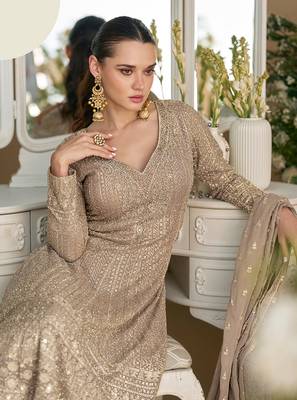 Faux georgette readymade palazzo suit with embroidered work in beige 2