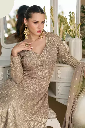 Faux georgette readymade palazzo suit with embroidered work in beige