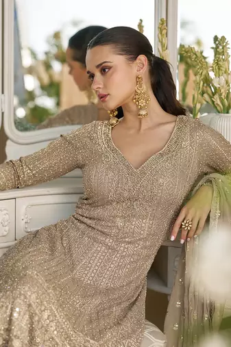 Faux georgette readymade palazzo suit with embroidered work in beige
