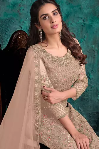 Beige embroidered net pant style salwar suit