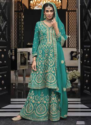 Faux georgette embroidered palazzo kameez in turquoise 1