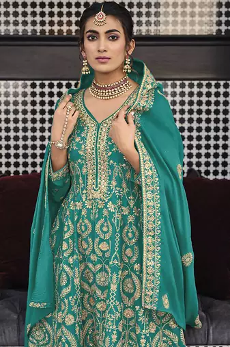 Faux georgette embroidered palazzo kameez in turquoise