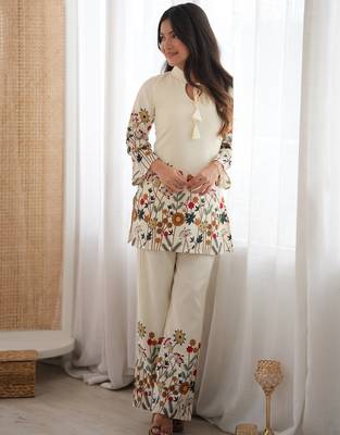 Women’s cream floral magic slub cotton kurta set with statement sleeves and flowing wide-leg palazzo 1