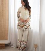 Women’s cream floral magic slub cotton kurta set with statement sleeves and flowing wide-leg palazzo