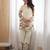 Women’s cream floral magic slub cotton kurta set with statement sleeves and flowing wide-leg palazzo