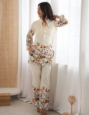 Women’s cream floral magic slub cotton kurta set with statement sleeves and flowing wide-leg palazzo 2