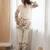 Women’s cream floral magic slub cotton kurta set with statement sleeves and flowing wide-leg palazzo
