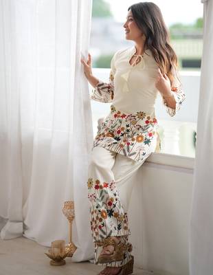 Women’s cream floral magic slub cotton kurta set with statement sleeves and flowing wide-leg palazzo 3