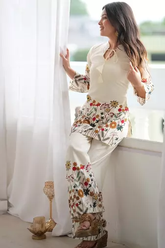 Women’s cream floral magic slub cotton kurta set with statement sleeves and flowing wide-leg palazzo