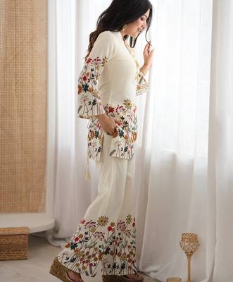 Women’s cream floral magic slub cotton kurta set with statement sleeves and flowing wide-leg palazzo 4