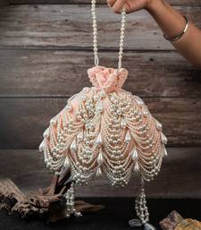 Blush pink embroidered suede potli bag