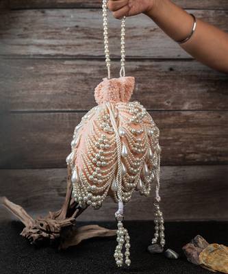 Blush pink embroidered suede potli bag 2