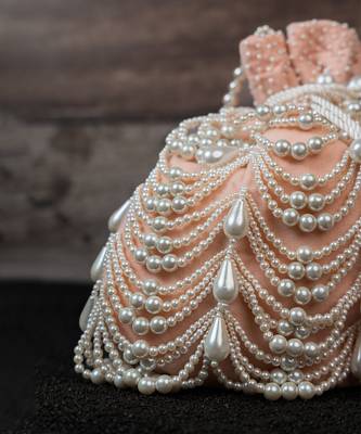 Blush pink embroidered suede potli bag 3