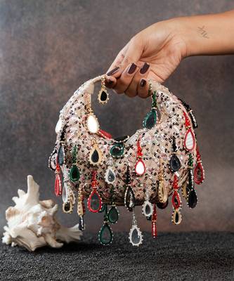 Off white embroidered silk clutch 1