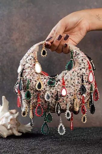 Off white embroidered silk clutch