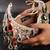 Off white embroidered silk clutch
