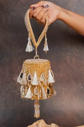Gold embroidered velvet bucket potli bag