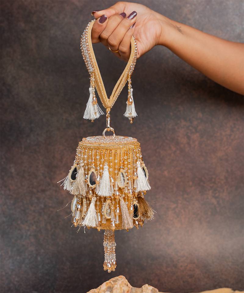 Gold embroidered velvet bucket potli bag