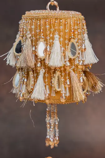 Gold embroidered velvet bucket potli bag