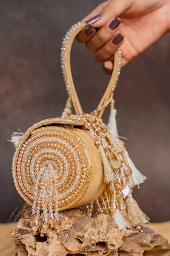 Gold embroidered velvet bucket potli bag