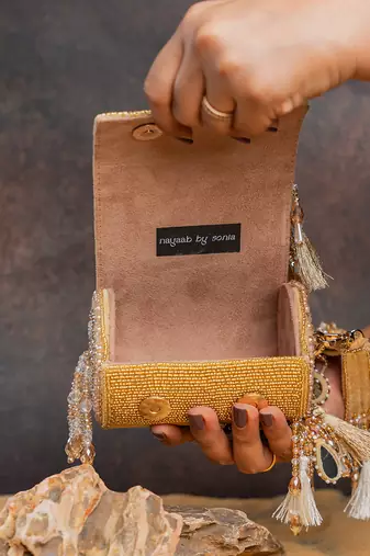Gold embroidered velvet bucket potli bag