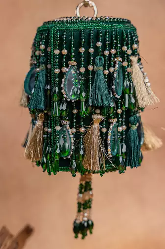 Emerald green embroidered velvet buket potli bag