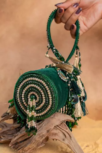 Emerald green embroidered velvet buket potli bag