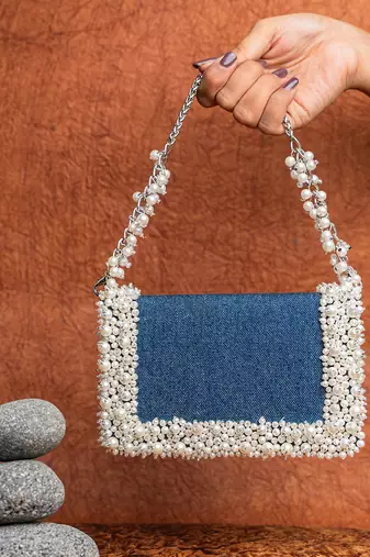 Denim blue beaded embroidered clutch