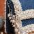 Denim blue beaded embroidered clutch