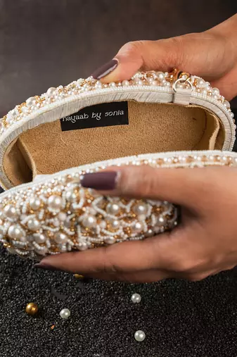 White pearl embroidered silk clutch
