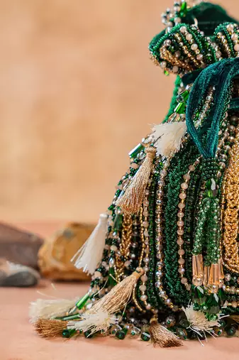 Emerald green embroidered silk potli bag