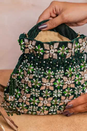 Deep green embroidered velvet potli bag