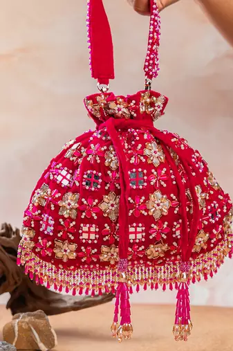 Hot pink embroidered velvet potli bag
