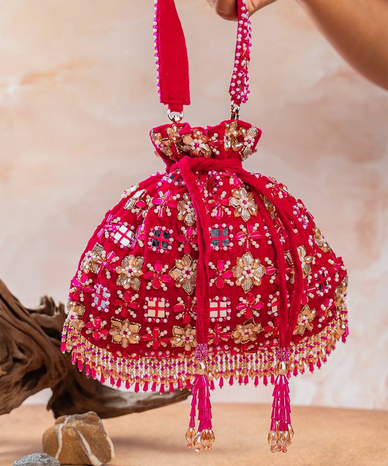Hot pink embroidered velvet potli bag