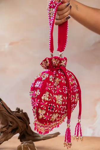 Hot pink embroidered velvet potli bag