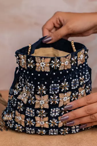 Jet black embroidered velvet potli bag