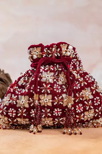 Red embroidered velvet potli bag