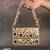 Gold mirror embroidered silk clutch