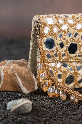 Gold mirror embroidered silk clutch