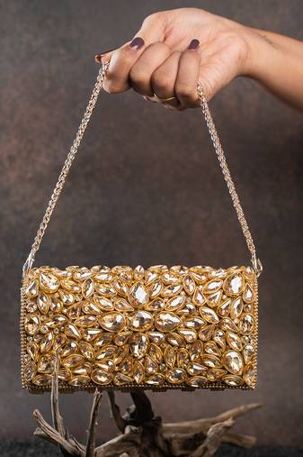 Gold kundan embroidered silk clutch