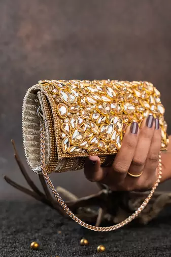 Gold kundan embroidered silk clutch